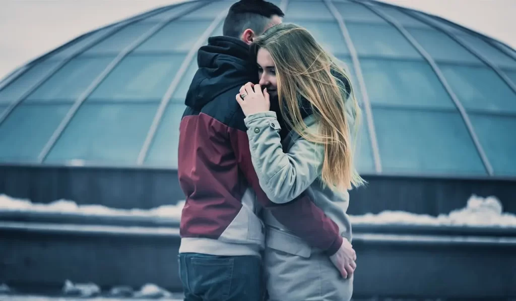 couple hugging on hug day